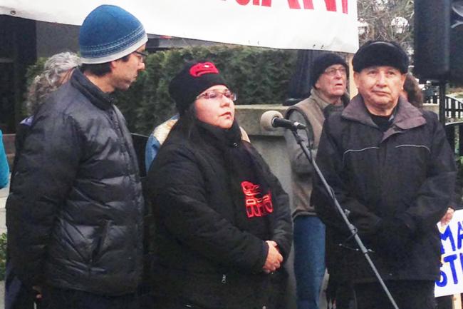 (Left to right) Nower Nicola Band Chief Aaron Sam and Neskonlith Indian Band chief Judy Wilson announce their withdrawal from the NEB environmental assessment hearings, with Grand Chief Stewart Phillip looking on. (@earyn604/Twitter)