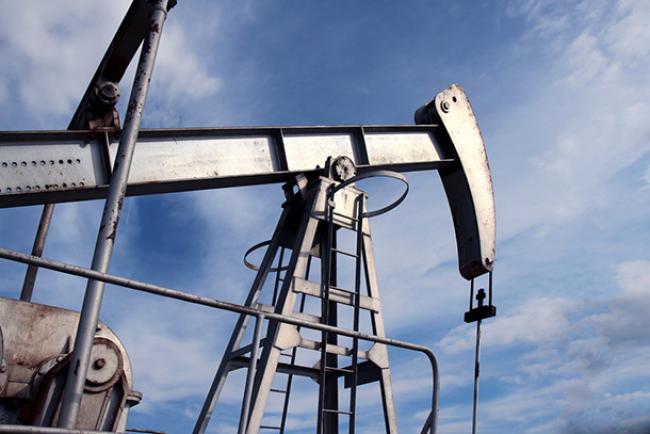 pump jack.  According to IMF economists, Canadian carbon-based fuels should be taxed an additional $17.2 billion annually to compensate for climate change. Oil photo via Shutterstock.