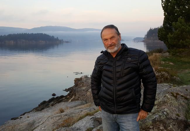 A smile in the face of reality. UBC ecological economist William E. Rees, co-creator of the ecological footprint concept, has some bad news for techno-optimists. Photo on Salt Spring Island provided by W. Rees.