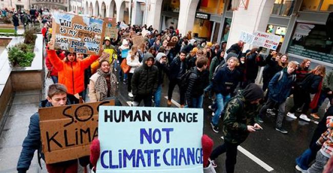 Students demonstrate in Brussels Thursday calling for climate action. NICOLAS MAETERLINCK / AFP / Getty Images