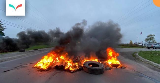 Tire fire - Failed arrest attempt leads to police retreat, barricades of burning tires - Christopher Curtis