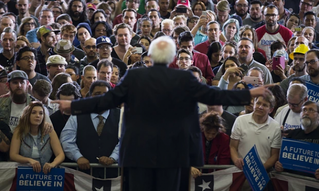 Bernie Sanders makes clear he wants to restore progressive taxation and a higher minimum wage. Photograph: Evan Vucci/AP
