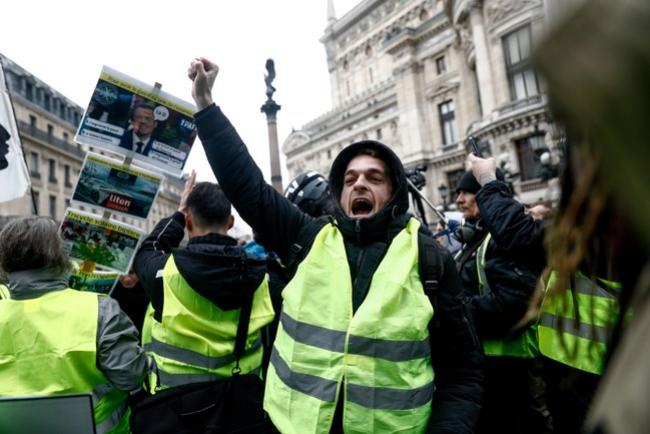 In recent weeks, France has been seized by the gilets jaunes, an amorphous, leaderless protest group that consists, in part, of people like Édouard Louis’s family and former neighbors.Photograph by Sameer Al-Doumy / AFP / Getty