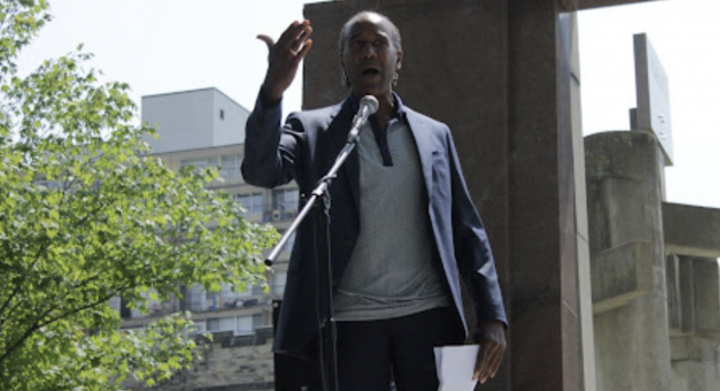 photo: Courtney Betty, a member of the legal team for the Black Class Action Secretariat, speaks to the crowd on Thursday, August 1. Gabriela Calugay-Casuga.