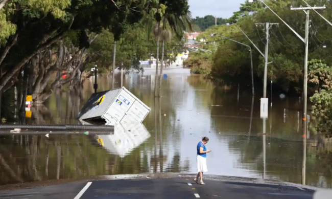 Flooded streets in New South Wales, Australia, last month. Photograph: Jason O'Brien/AAP