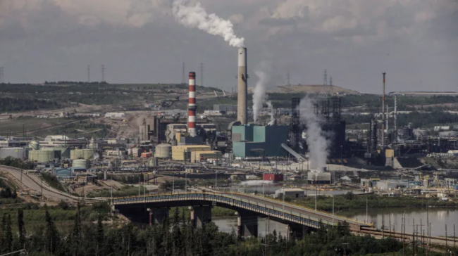 Vancouver city council has approved a motion to back a plan to take oil companies to court for their role in climate change. (Jason Franson/The Canadian Press)