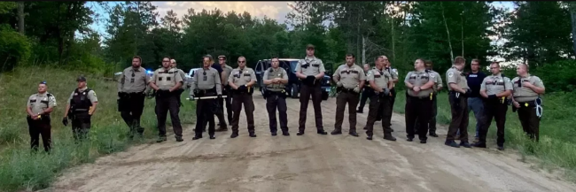 On July 23, 2021, a Minnesota court ordered Hubbard County police officers to stop obstructing a driveway that leads to a Line 3 pipeline protest camp. (Photo: Giniw Collective)