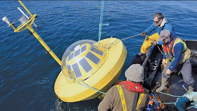 University of Victoria researchers with the Pacific Regional Institute for Marine Energy Discovery’s (PRIMED), deploying a wave energy monitoring buoy above, just got $2 million for a tidal energy project in B.C.'s Discovery Islands. Photo UVic