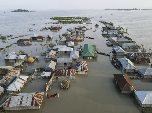 Submerged area is seen after flash floods in Sunamganj, Bangladesh. Photo by Muhammad Amdad Hossain / Climate Visuals