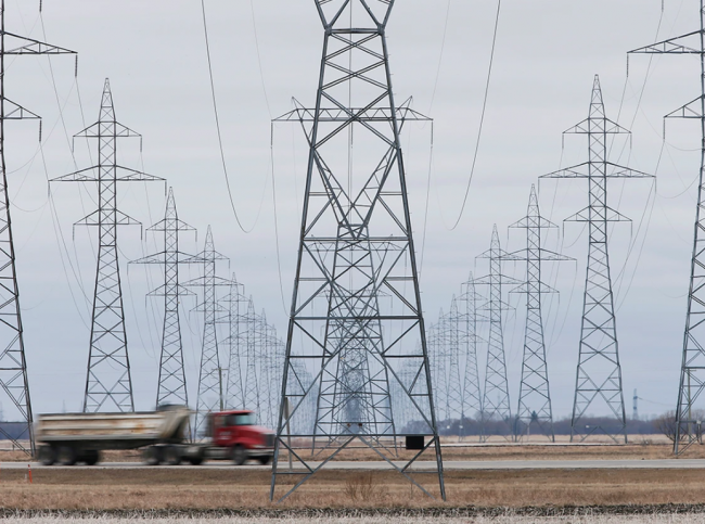Manitoba Hydro power lines are photographed just outside Winnipeg. PHOTO BY JOHN WOODS/THE CANADIAN PRESS