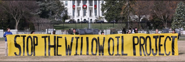 Students and community members demand President Joe Biden stop the Willow project by unfurling a banner on the Ellipse outside the White House on December 02, 2022, in Washington, D.C. (Photo: Paul Morigi/Getty Images for This is Zero Hour)