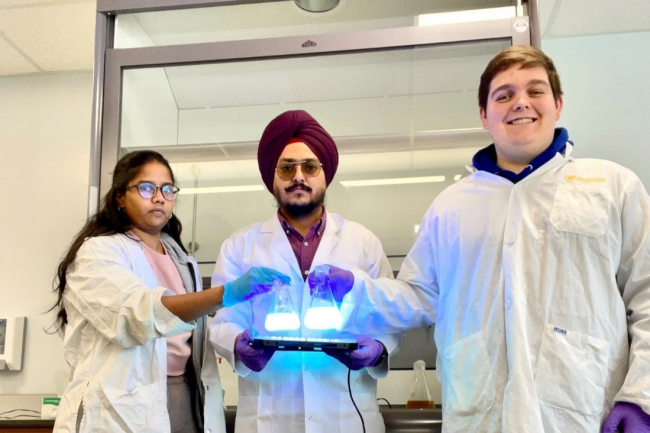 Gurpreet Singh Selopal’s research team with their “quantum dots” for sustainable energy technologies. Photo courtesy of Dalhousie University