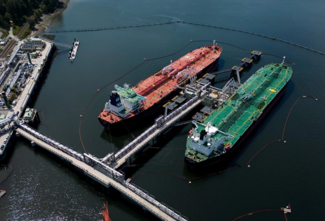 Crude oil tankers SFL Sabine, back left, and Tarbet Spirit are seen docked at the Trans Mountain Westridge Marine Terminal, where crude oil from the expanded Trans Mountain Pipeline is loaded onto tankers, in Burnaby on June 10, 2024 Photo by DARRYL DYCK /THE CANADIAN PRESS