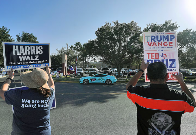 Supporters of Kamala Harris and Donald Trump campaigned outside a polling place in McAllen, Texas, on Nov. 5.Joel Martinez/Associated Press