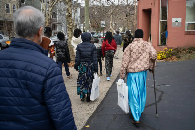 A family of refugees from Sudan arriving in Connecticut last year. People from the war-torn country are eligible for a program that allows them to live and work legally in the United States.Credit...Todd Heisler/The New York Times