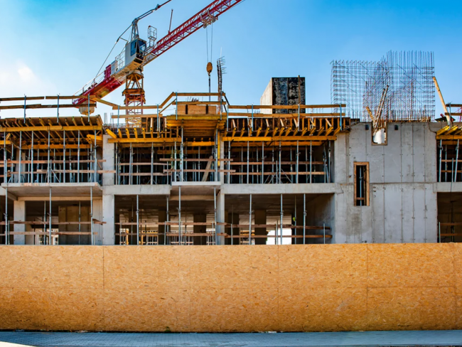 Using modern construction methods such as prefabrication and modular construction can reduce costs, time and emissions. But in Canada, regulatory changes are needed too. Photo via Shutterstock.