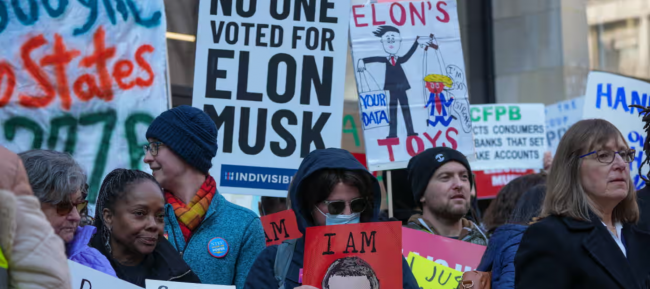 Demonstrators gather outside the Consumer Financial Protection Bureau to protest against Donald Trump's move to close it, Washington DC, 10 February 2025. Photograph: Andrew Leyden/NurPhoto/REX/Shutterstock