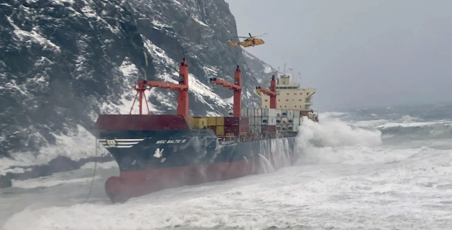 Canadian Coast Guard and the Department of Defence joint search and rescue (SAR) team evacuated 20 mariners from a grounded cargo ship on Feb. 15 off the coast of Newfoundland during a storm. Fisheries and Oceans Canada (DFO) and the CCG are suffering financial strain of maintaining core services in face of rising climate impacts and extreme weather. Facebook photo / Canadian Coast Guard