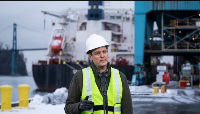 Premier David Eby speaks at PKM Canada Marine Terminals in North Vancouver, B.C, on Monday, Feb 3, 2025. (Ben Nelms/CBC)