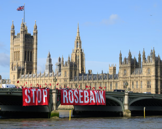 Fossil Free London protesters on Westminster Bridge, London, demonstrate against drilling at the UK’s largest untapped oilfield, 16 July 2025. Photograph: Leon Neal/Getty Images