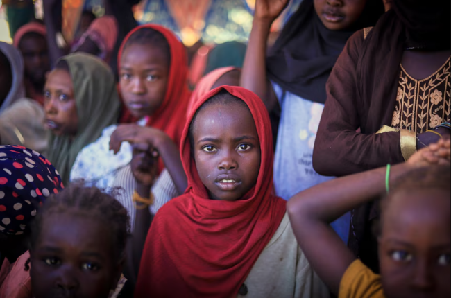 Displaced women and children from el-Fasher pictured at a refugee camp earlier this week. (AP: Norwegian Refugee Council/Marwan Mohammed)