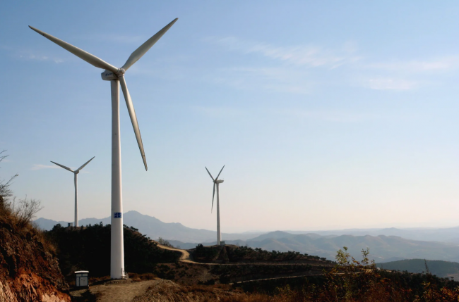Wind turbines in China, where clean energy is responsible for 10 per cent of the country’s GDP and emissions are now flattening. Tangshanpeng Wind Farm, China. Photo by Land Rover Our Planet/Flickr(CC BY-ND 2.0)