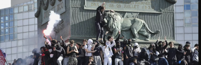 Protesters are seen on the July Column during a protest on Place de la Bastille on October 08, 2026 in Paris, France. (Photo by Remon Haazen/Getty Images)