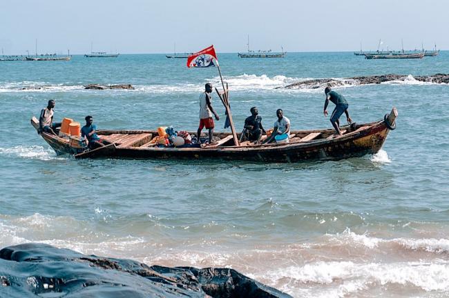 Oceans don’t only provide a livelihood for fishers around the world, such as those pictured above in Ghana, but they also absorb a lion’s share of human-cased fossil fuel emissions. Photo by Seyiram Kweku / Unsplash