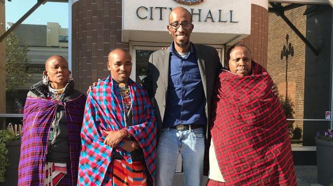 Victoria Coun. Sharmarke Dubow gives Maasai visitors a tour of city hall. Photo submitted by Sharmarke Dubow