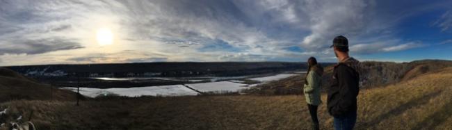 Clay and Katy Peck stand on their property, overlooking family farmland that will be flooded by the Site C Dam. Photo: Sarah Cox.