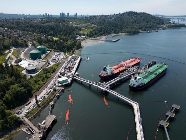 Supertankers in the Salish Sea would carry two and a half times as much oil as tankers from the Trans Mountain pipeline, pictured above in Burnaby, BC. Photo by Darryl Dyck, the Canadian Press.