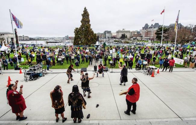 Protesters at the legislature grounds watch the Esquimalt Singers and Dancers perform Saturday at The Last Stand, a rally against logging of old-growth forests. DARREN STONE, TIMES COLONIST