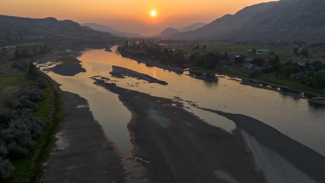 Over half of Canada is in drought, and it's having deep impacts that mean some rain doesn't solve the problem. British Columbia has been in drought since 2022, and in 2023, the Thompson River east of Kamloops, B.C. hit one of its lowest points in recent history, during a historic drought and under a sky hazy with wildfire smoke. Photo: Jesse Winter / The Narwhal