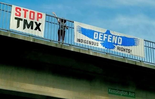 A banner hung on the Kensington overpass that spans Highway 1 in Burnaby. Submitted photo