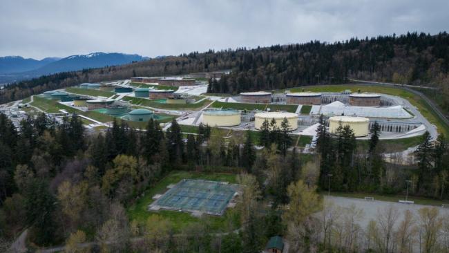 Nearly six months after its opening, the Trans Mountain pipeline expansion is boosting Canada's energy sector as promised — but questions still linger about who will pay for the project's massive cost overruns. In this photograph taken with a drone, the Trans Mountain Burnaby Terminal tank farm is seen in Burnaby, B.C., on Thursday, April 4, 2024. THE CANADIAN PRESS/Darryl Dyck