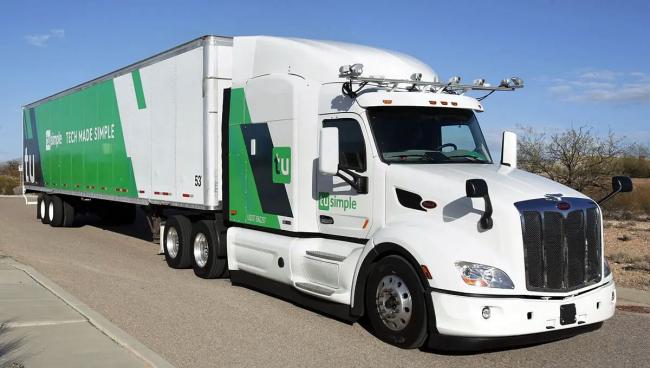 Notice there is no driver in the driver's seat in this semi. Driverless trucks have already barreled down certain stretches of California highways and the Teamsters are fighting hard to stop them. | Photo credit: TuSimple