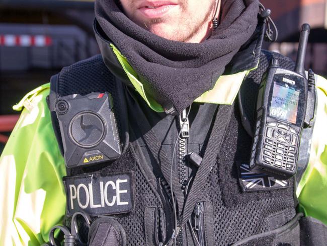 An officer with a body camera in Manchester, UK. Body cams are common in many police forces across Europe, and the VPD plan to outfit their officers with them by 2025. But critics point out body cams record police violence — they don’t stop it. Photo via Shutterstock.