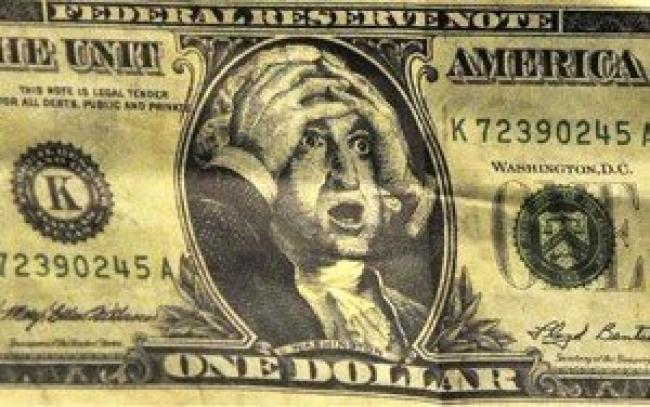 US Dollar note with hands on head!