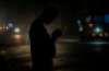 Resident looks at his cell phone during power failure in Havana, Cuba, October 20, 2024. Ramon Espinosa/AP