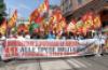Members of USB march against militarism and for Palestine. USB / X.