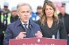 Mark Carney announced Thursday, alongside Danielle Smith in Fort McMurray, that the West Coast pipeline will go ahead as a project in the national interest. Photo by Greg Halinda, the Canadian Press.