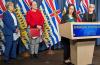 Care aide Edil Bukid said the changes are ‘about dignity for workers, for seniors and for their families who trust us.’ She was joined by the HEU’s Lynn Bueckert, MLA Susie Chant and Health Minister Josie Osborne for the announcement. Photo for The Tyee by Andrew MacLeod.