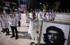 Doctors and nurses from one of Cuba’s Henry Reeve brigades are bid farewell before leaving to Turkey to care for the victims of the earthquake the, at the Central Unit of Medical Cooperation in Havana, on February 10, 2023. (Yamil Lage / AFP via Getty Images)