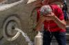 A man cools off during a heat wave in Rome on July 1, 2025. Credit: Antonio Masiello/Getty Images