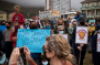 People take part in a protest against the plan by Dutch oil company Shell to conduct underwater seismic surveys along South Africa in 2021. Photograph: Rodger Bosch/AFP/Getty Images