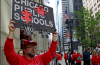 Craig Cleve marches with members of the Chicago Teachers Union as they picket outside City Hall on July 2, 2015. Christian K. Lee/AP