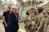 FILE - Republican presidential candidate former President Donald Trump greets members of the National Guard on the U.S.-Mexico border, Feb. 29, 2024, in Eagle Pass, Texas. (AP Photo/Eric Gay, File)