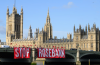 Fossil Free London protesters on Westminster Bridge, London, demonstrate against drilling at the UK’s largest untapped oilfield, 16 July 2025. Photograph: Leon Neal/Getty Images