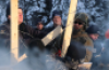 Members of the RCMP move in to enforce an injunction against Wet'suwet'en people and their supporters on a forest service road in the nation's traditional territory in northern B.C. on Jan. 7, 2019. (Chantelle Bellrichard/CBC)