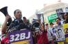 Jaime Contreras, Executive Vice President of SEIU labor union 32BJ, speaks during an immigrant rights protest outside of the Department of Justice headquarters in Washington, D.C. on June 9, 2025. ,BRYAN DOZIER/Middle East Images/AFP via Getty Images